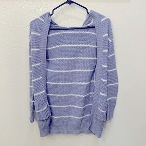 This is a trendy blue cardigan hoodie with pockets!